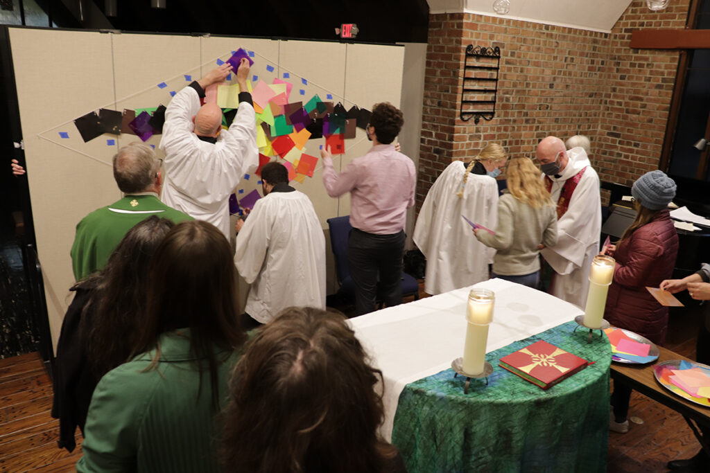 Worship participants make art together during collaborative sermon in All Saints Chapel